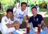 Sadaaki Saito and friends enjoy iced tea at the Hyatt Regency Saipan during the 2nd Saipan Marathon awards ceremony on Saturday. (Brad E. Ruszala)